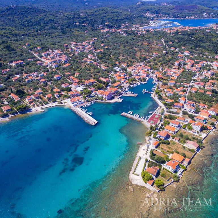 GRAĐEVINSKO ZEMLJIŠTE – MIRNA LOKACIJA – POLJANA, UGLJAN