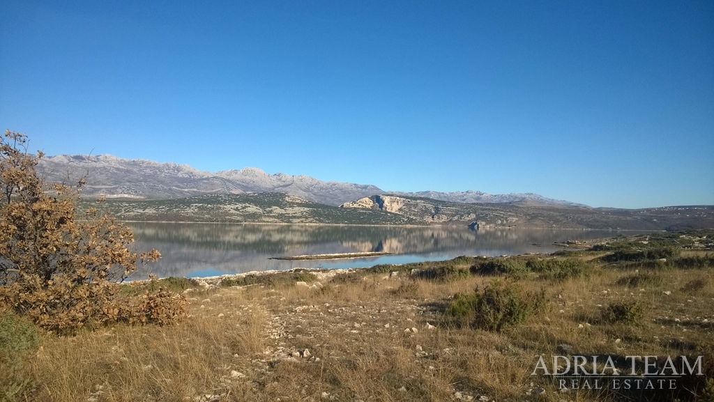 GRAĐEVINSKA PARCELA S PANORAMSKIM POGLEDOM NA MORE – NOVIGRAD